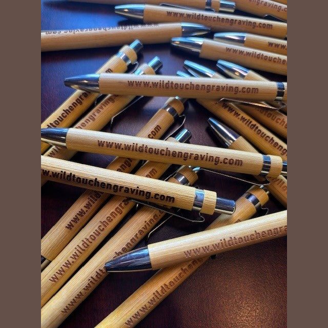 Custom bamboo pens engraved with a business website